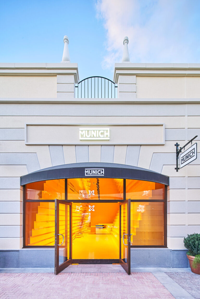 Yellow Store Design studio animal steps bright yellow walls for clothing store in malaga, spain