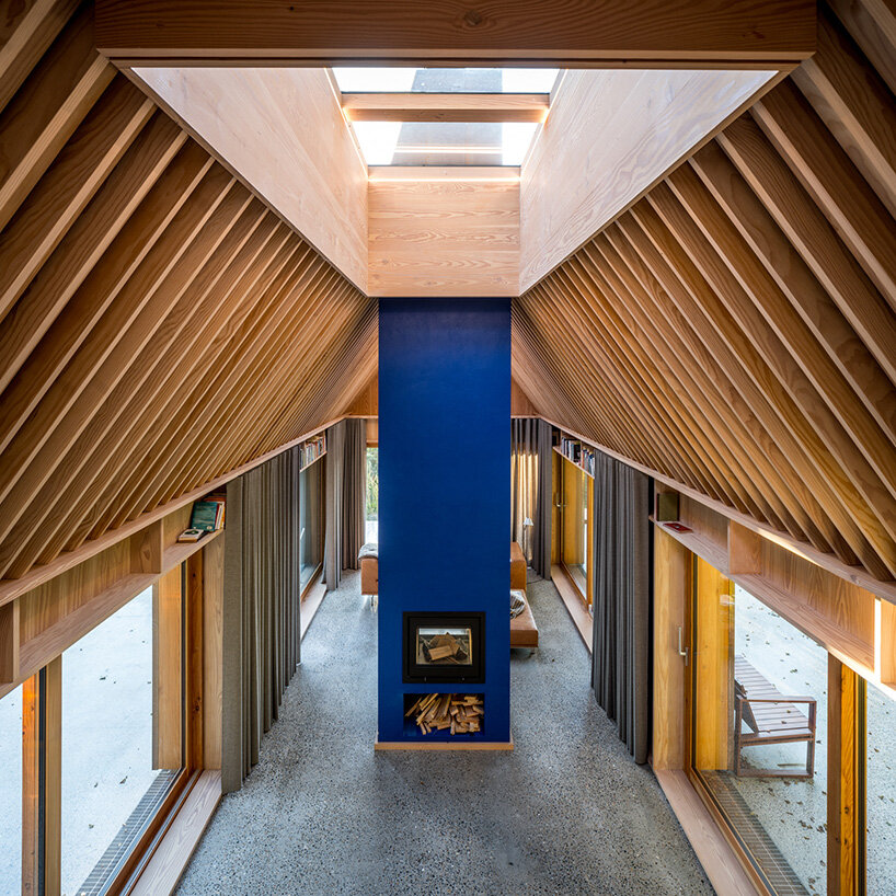 SLETH inserts copper-clad getaway cabin into danish forest