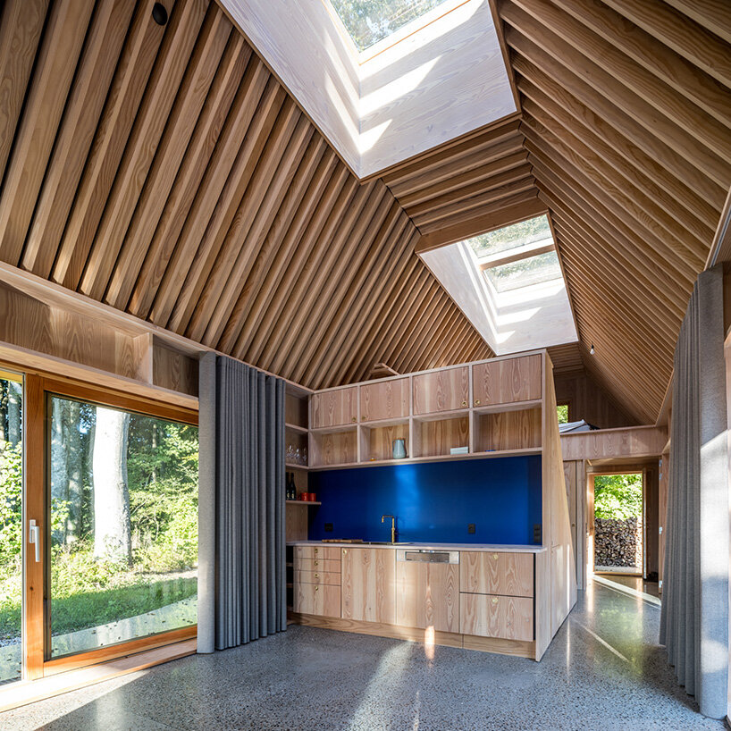 SLETH inserts copper-clad getaway cabin into danish forest