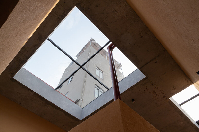 this vietnamese family house by toob studio is deliberately left unfinished