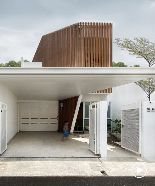 vertical timber slats carve up this residence in indonesia by aaksen responsible aarchitecture