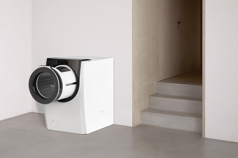 the visdom machine machine by kim kyeong-su features a sliding drum that opens on top