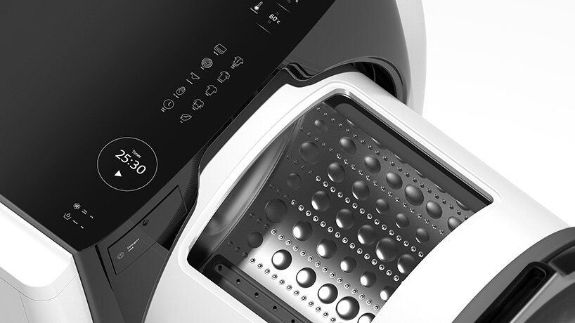 the visdom machine machine by kim kyeong-su features a sliding drum that opens on top