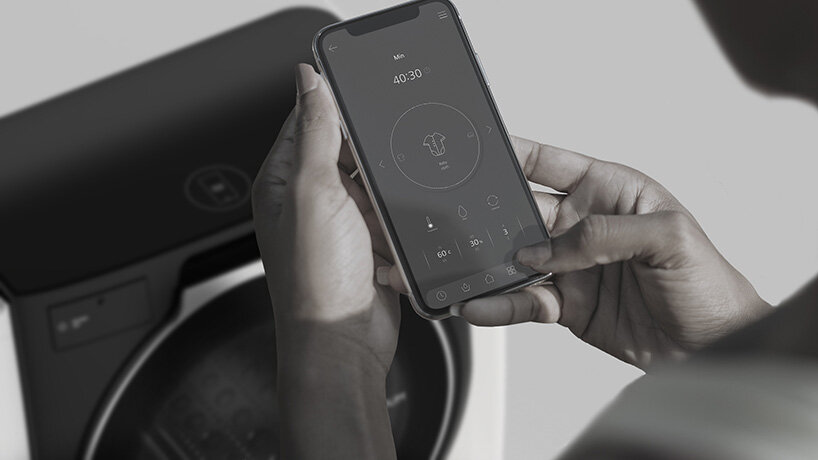 the visdom washing machine by kim kyeong-su features a sliding drum that opens on top
