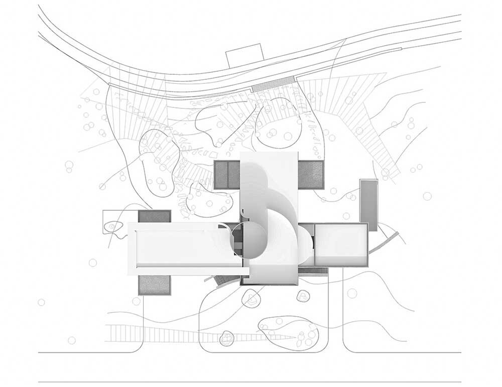 sharp lines + curved forms coexist within MAKHNO studio's concrete residence in ukraine