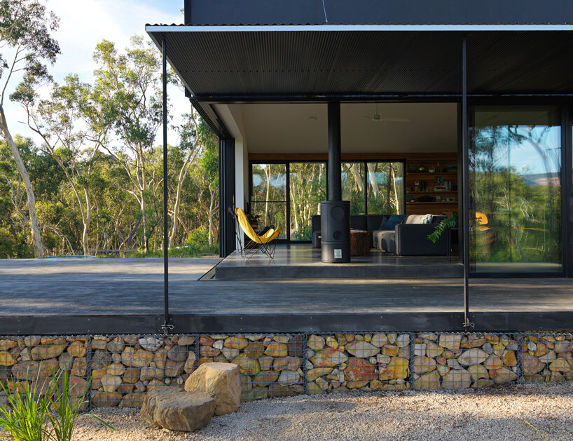 off-grid house is a bushfire resistant dwelling in blue mountains, australia
