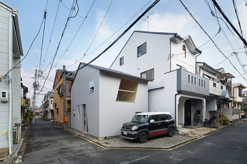 alphaville architects completes a tiny house with dizzying plywood ...