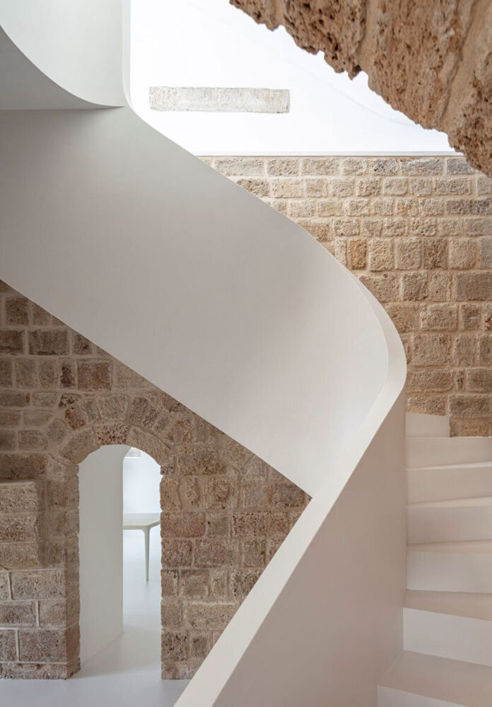 tipo949 hybridizes modern dwelling with ancient stonework of old jaffa