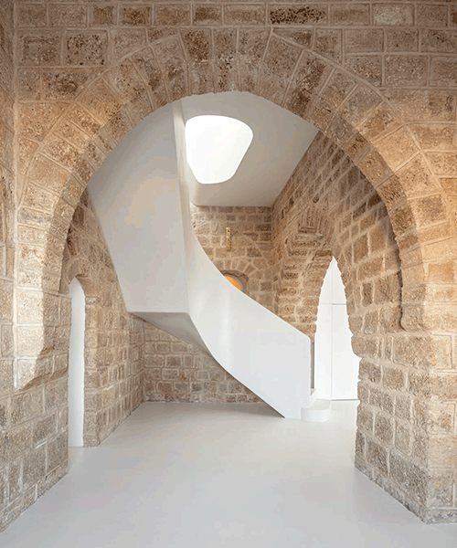 tipo949 renovation hybridizes contemporary dwelling with ancient stonework of old jaffa