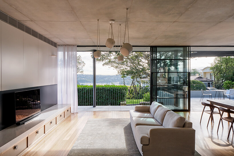 tribe studio architects' mosman house II takes shape as a floating, charred timber volume