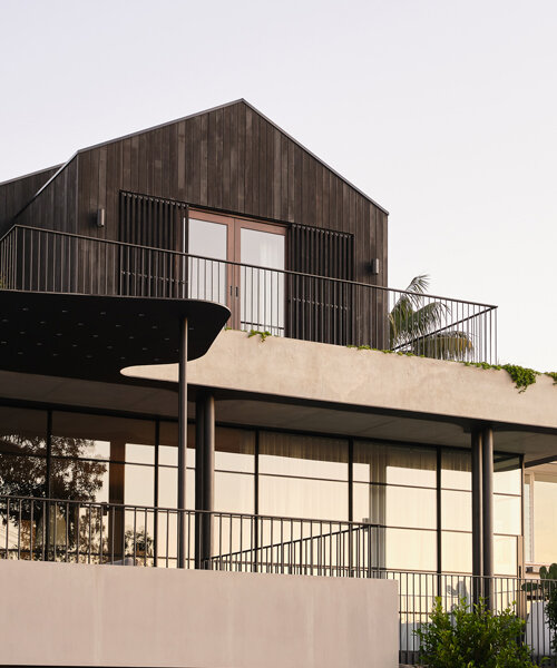 tribe studio architects' mosman house II takes shape as a floating, charred timber volume