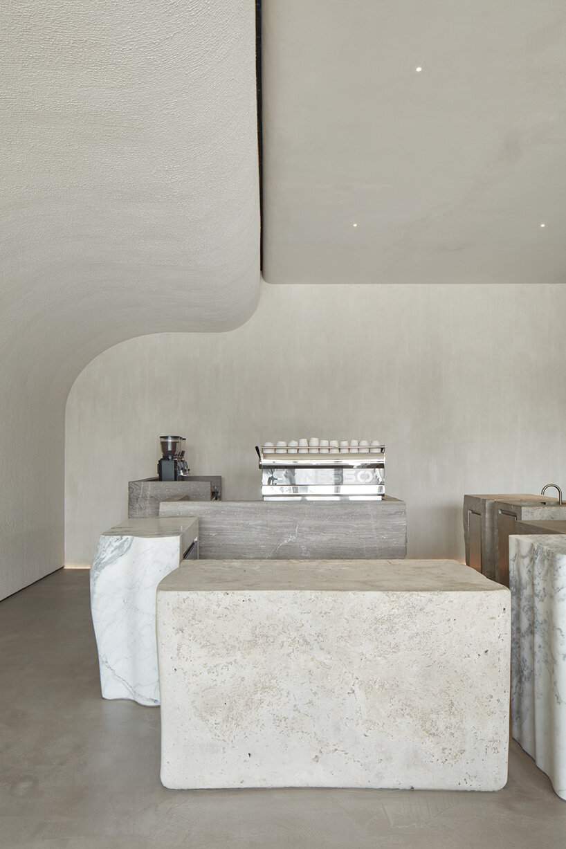 VSHD designs coffee shop in dubai with blocks of monolithic stone