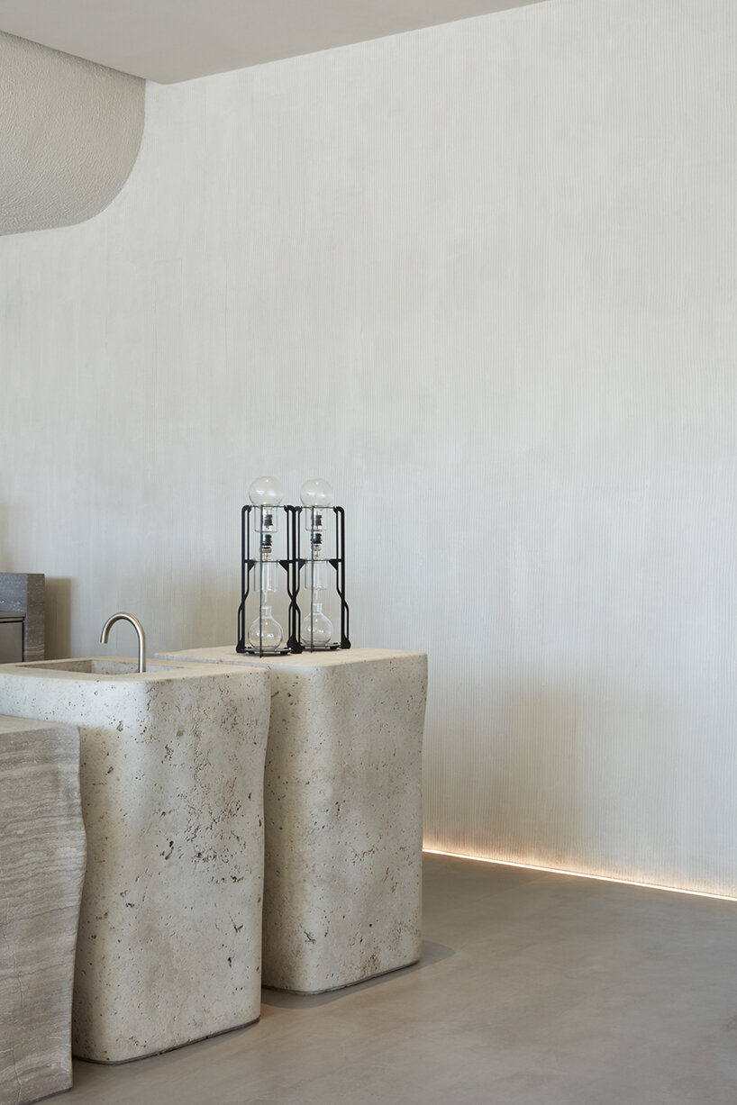 VSHD designs coffee shop in dubai with blocks of monolithic stone