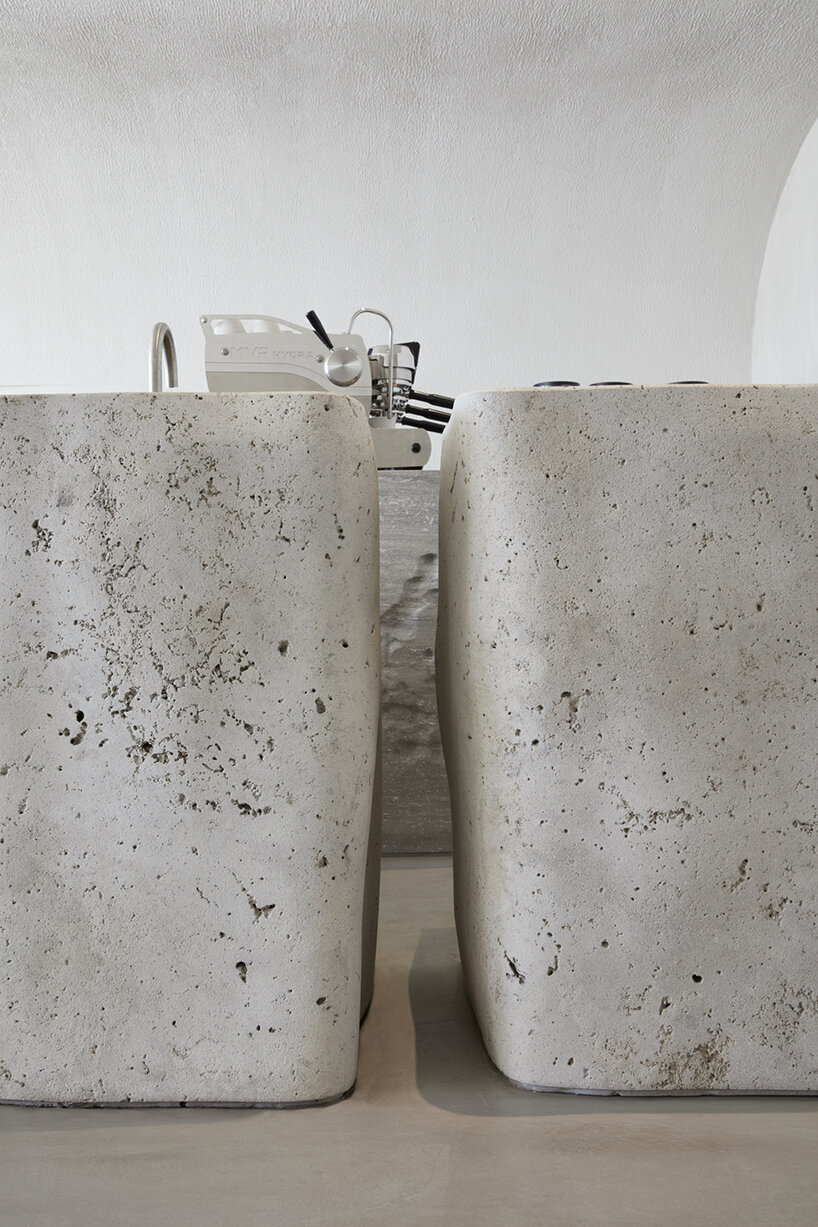 VSHD designs coffee shop in dubai with blocks of monolithic stone