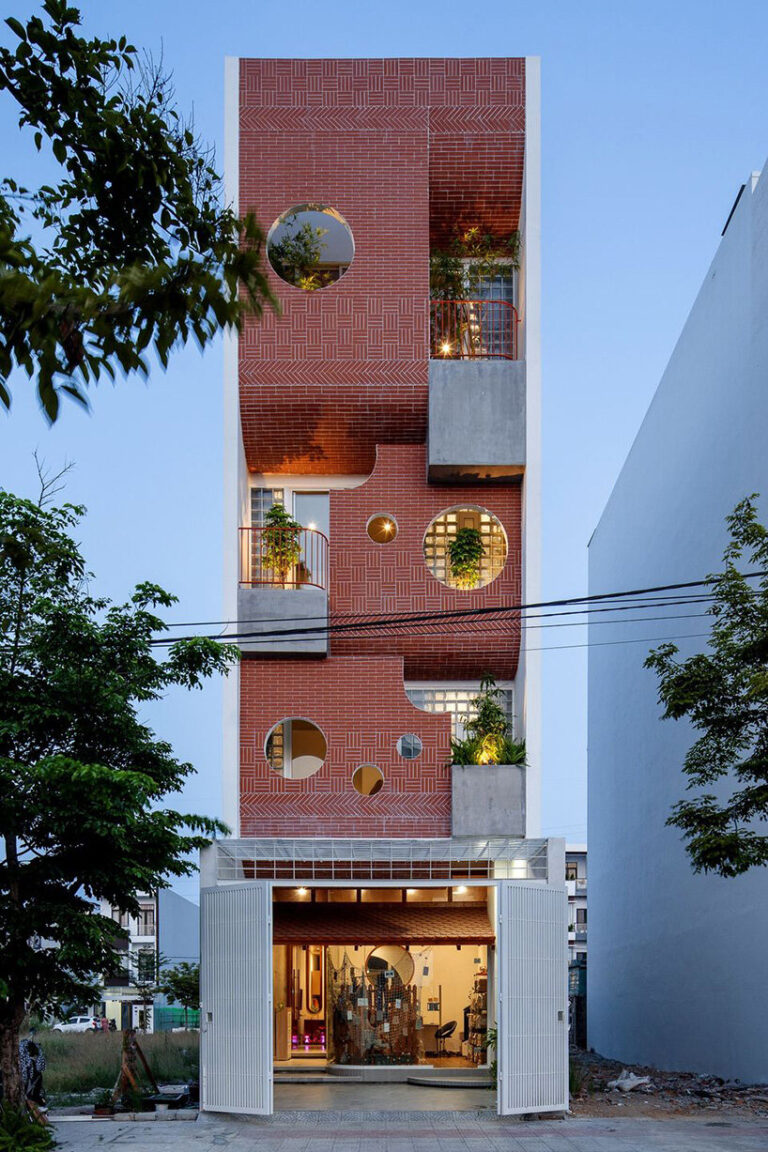 round openings + blank spaces form AD9 architects' vietnamese house