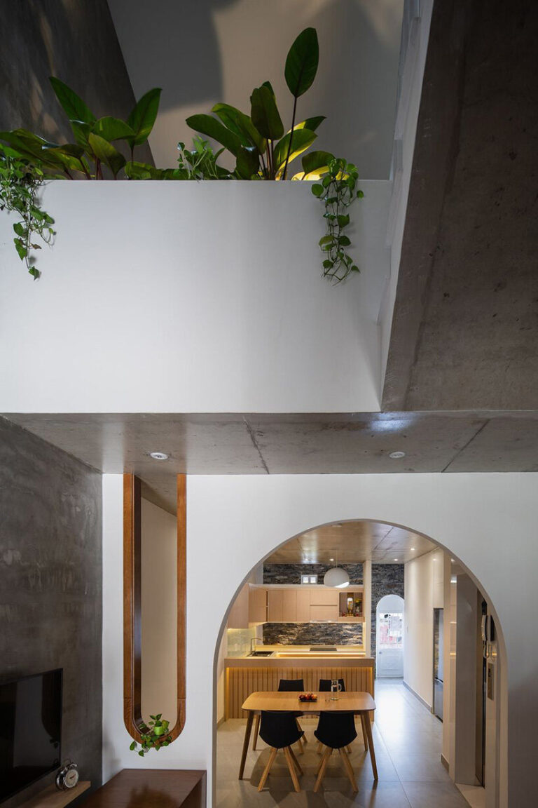 round openings + blank spaces form AD9 architects' vietnamese house