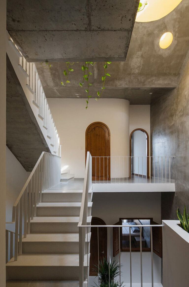 round openings + blank spaces form AD9 architects' vietnamese house