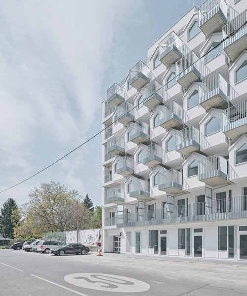 pitched roof volumes animate a vienna apartment block designed by BFA x KLK