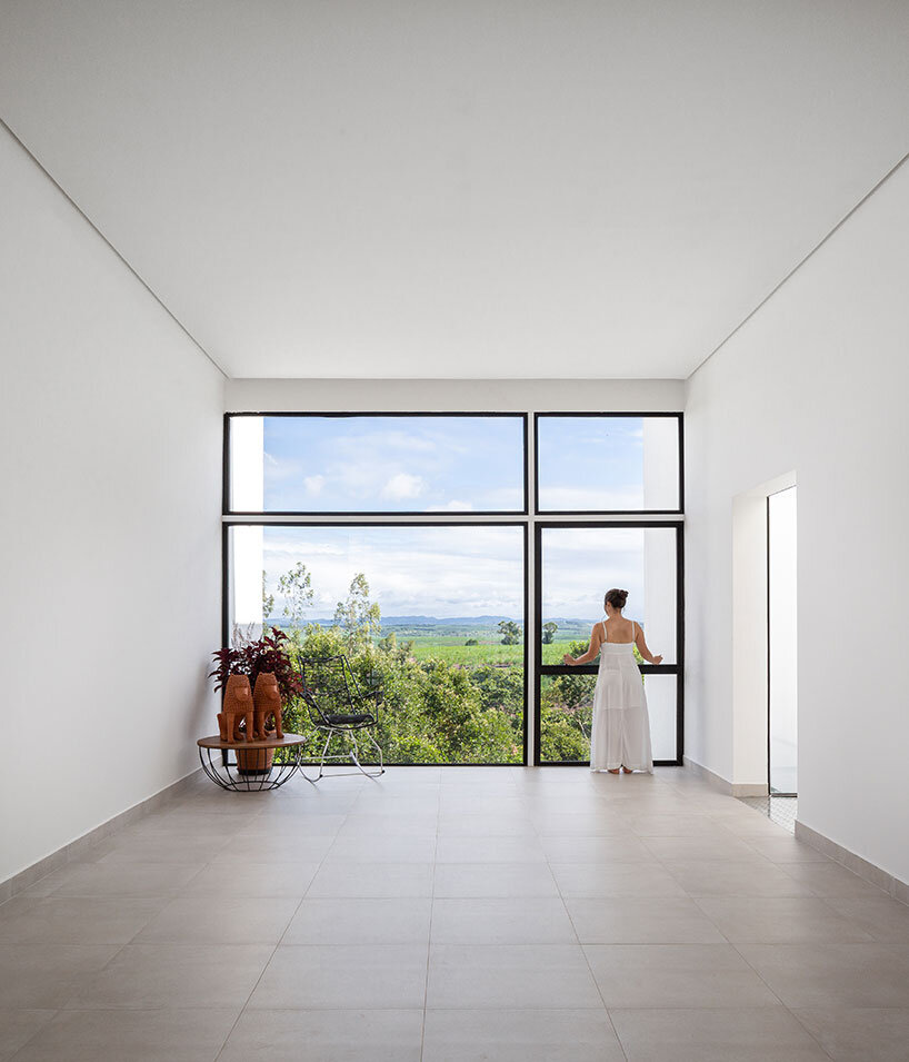 NEBR arquitetura's monolith carpina house rises from brazil's green lands