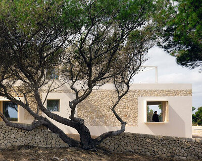 reclaimed limestone builds nomo studio's 'stone house' in menorca, spain