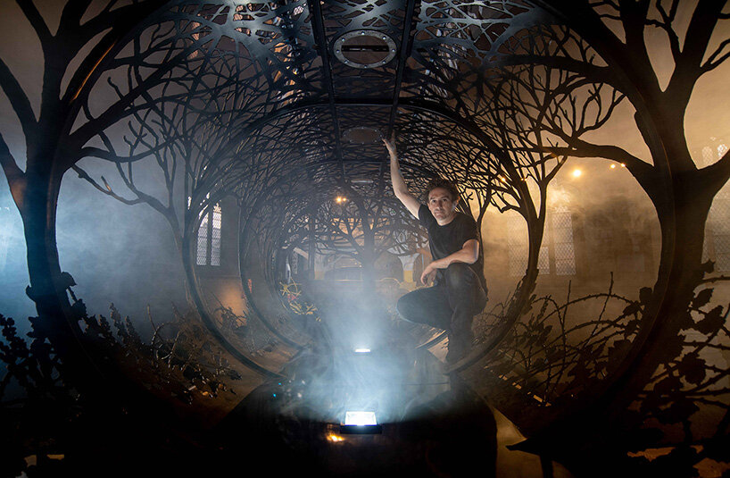 dan rawlings carves a steel forest into a reclaimed oil truck