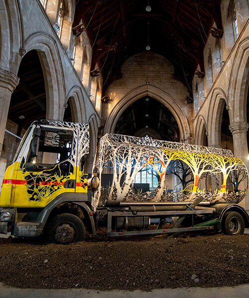 dan rawlings carves a steel forest into a reclaimed oil truck