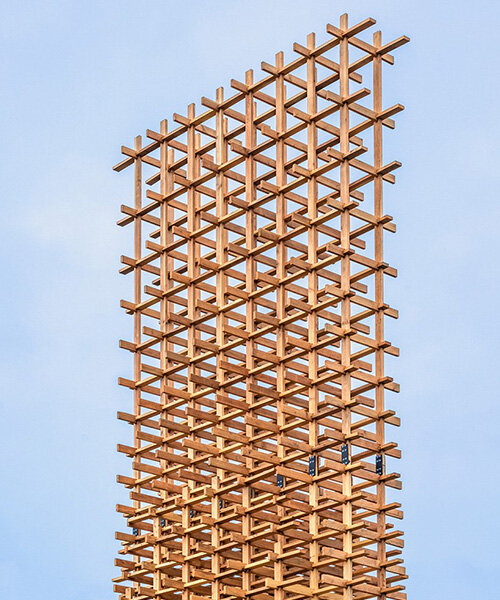 interlocking wooden planks form 9-meter-high 'tower' in taiwan by cheng tsung feng