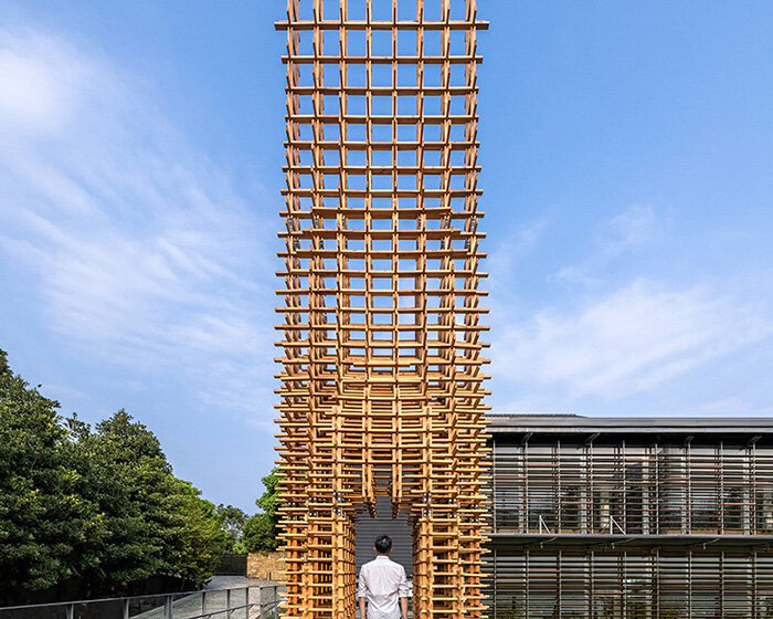 interlocking wooden planks form 9-meter-high 'tower' in taiwan by cheng tsung feng