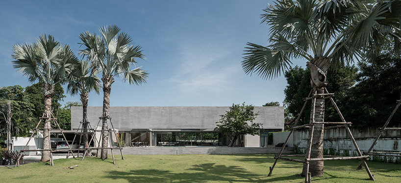 intersecting concrete slabs outline Stu/D/O architects' monolithic residence in thailand