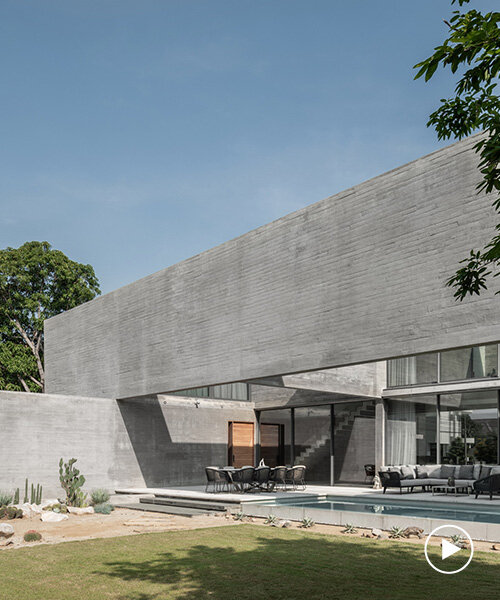 intersecting concrete slabs outline Stu/D/O architects' monolithic residence in thailand