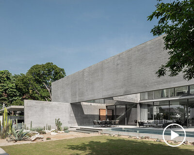intersecting concrete slabs outline Stu/D/O architects' monolithic residence in thailand