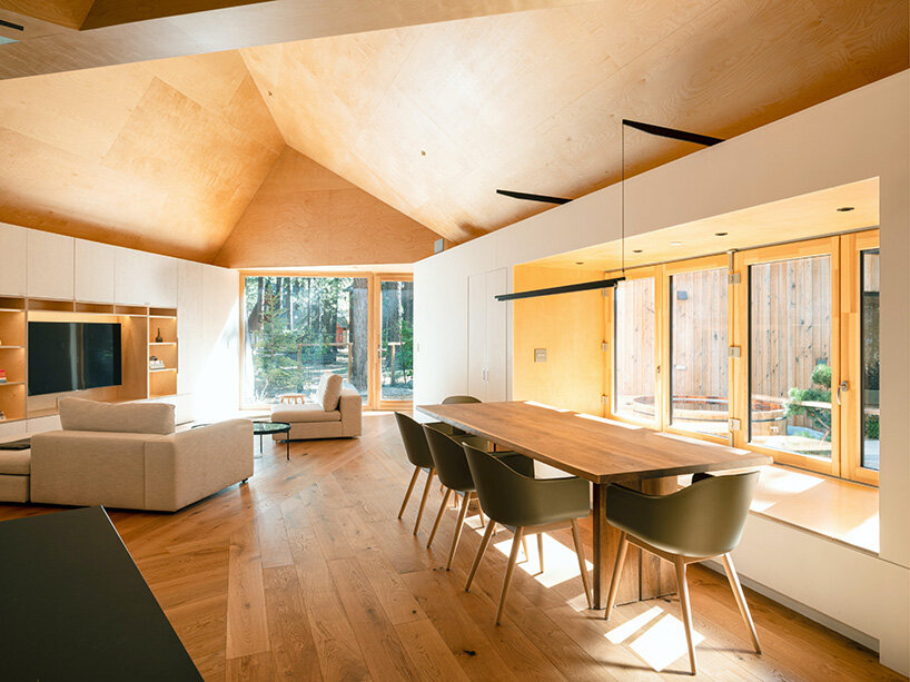 joongwon architects builds a translucent cabin in lake tahoe designed around the trees