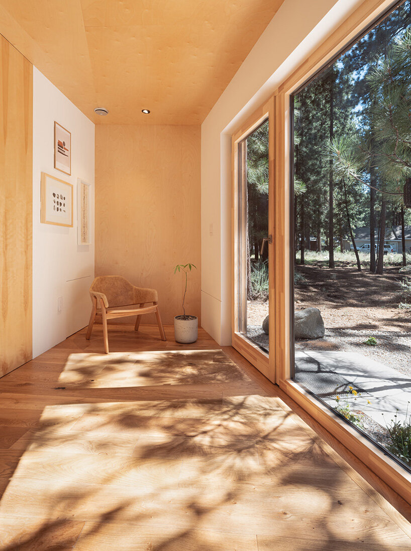 joongwon architects builds a translucent cabin in lake tahoe designed around the trees