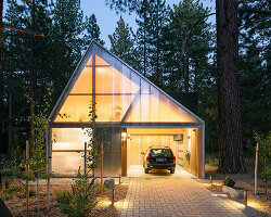 joongwon architects builds a translucent cabin in lake tahoe designed around the trees