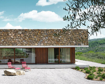 natural stone + wooden infills realize mediterranean house at the foot of mount amiata, italy