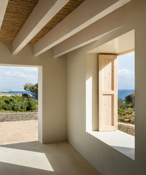 reclaimed limestone builds nomo studio's 'stone house' in menorca, spain