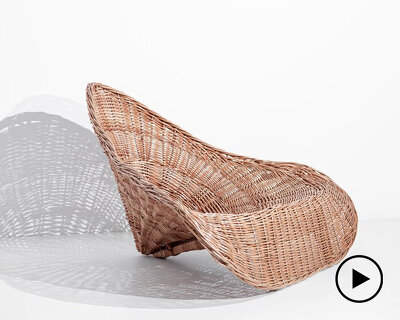 'pico' is a sculptural lounge chair made of traditional wicker weaving