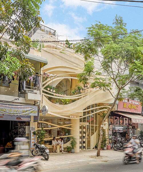 'september cafe' in vietnam reinterprets bird’s nest using steel strips