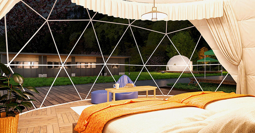seven dome-like glamping tents emerge from the japanese woodland
