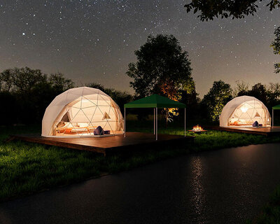 seven dome-like glamping tents emerge from the japanese woodland