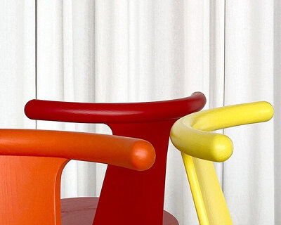 simple yet bold 'viva' chair appears as a fun pop of color around the kitchen table