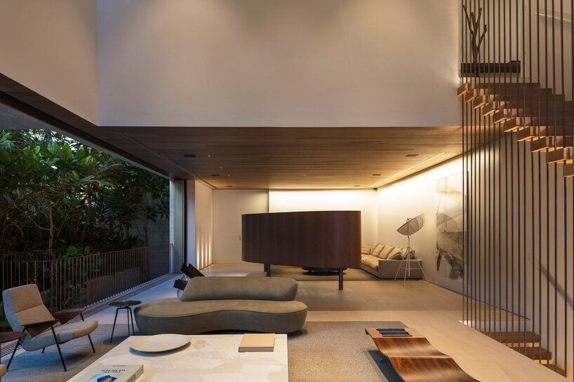 zenithal skylight illuminates minimalist JD house by studio arthur casas in brazil
