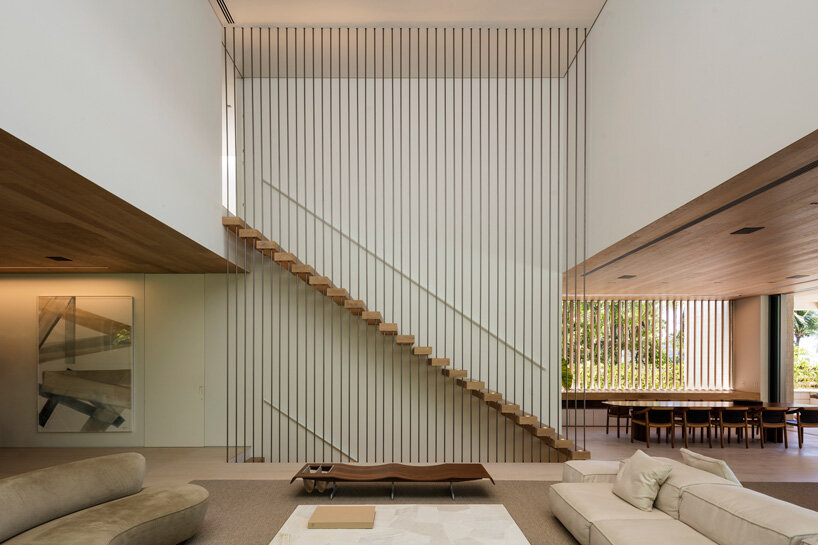 zenithal skylight illuminates minimalist JD house by studio arthur casas in brazil