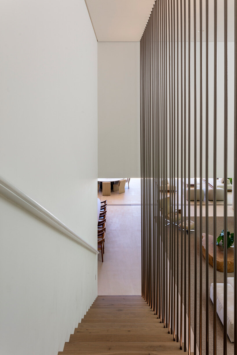 zenithal skylight illuminates minimalist JD house by studio arthur casas in brazil