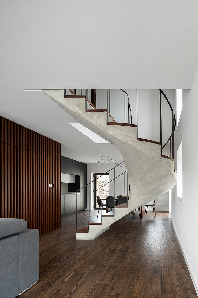 tiago sousa inserts box house into the ruins of traditional portuguese structure