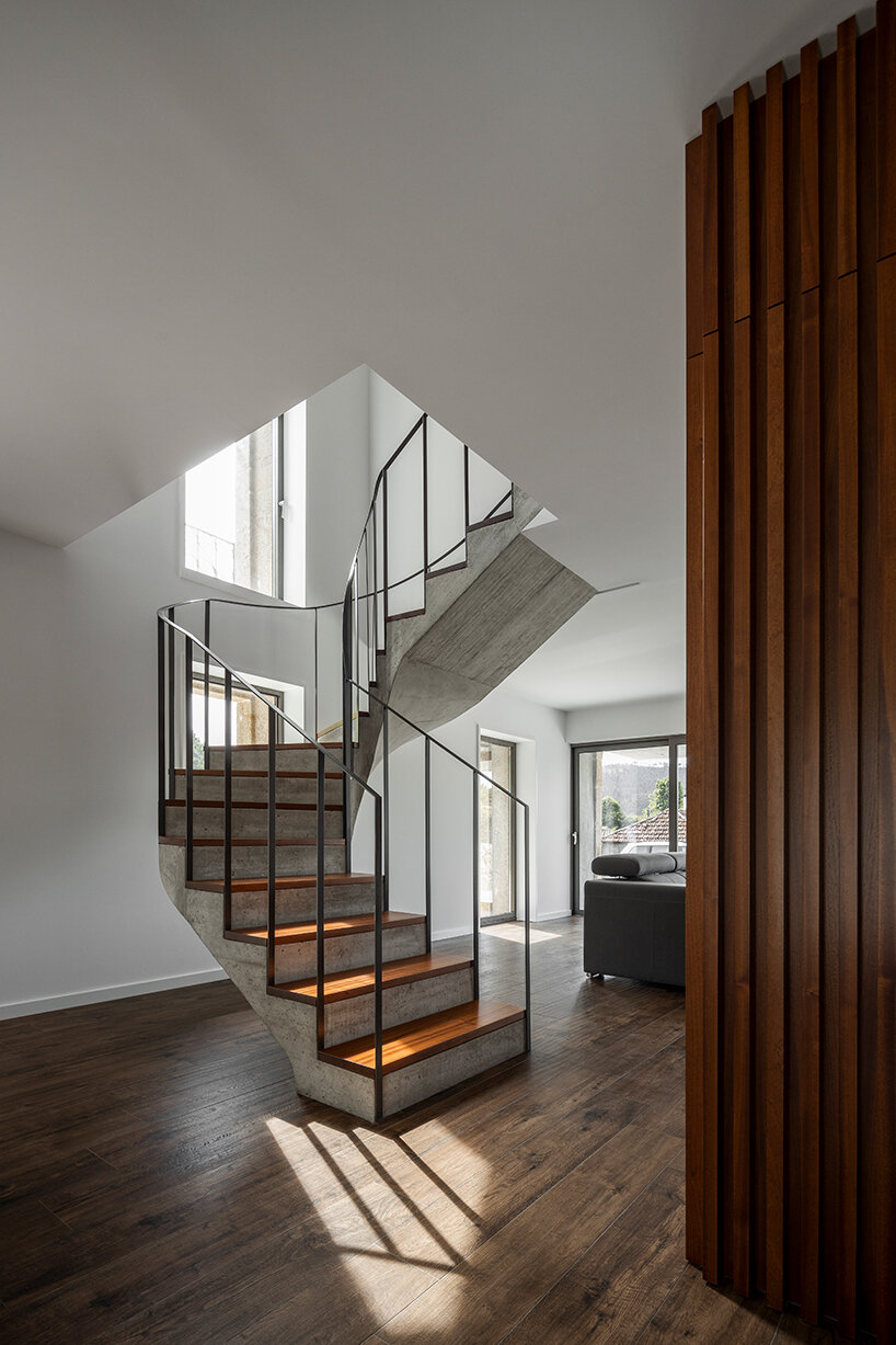 tiago sousa inserts box house into the ruins of traditional portuguese structure