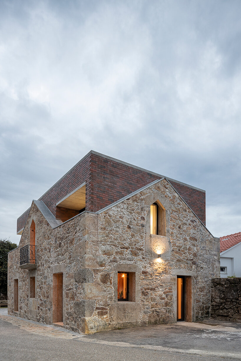 tiago sousa inserts box house into the ruins of traditional portuguese structure