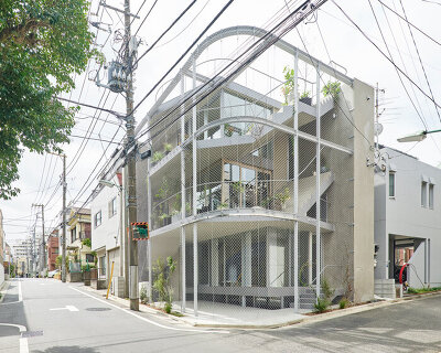n o t architects studio's chain link 'weather house' is an extension of tokyo's parks