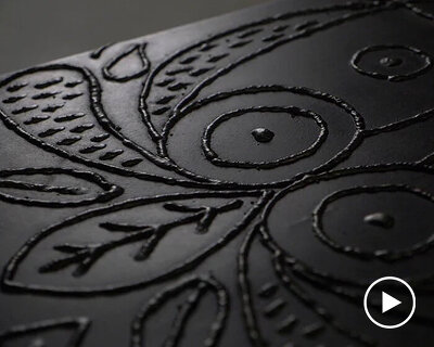 andré teoman welds onto metal to create tattoo-inspired furniture pieces