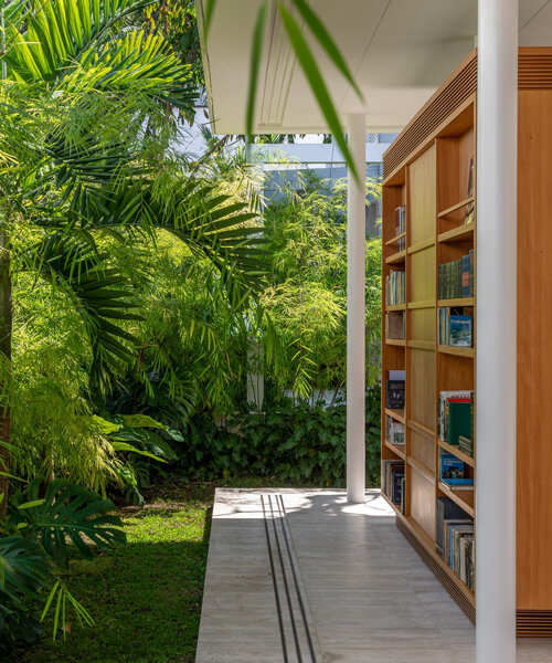 siqueira + azul arquitetura curates a breezy, light-filled 'book house' in brazil